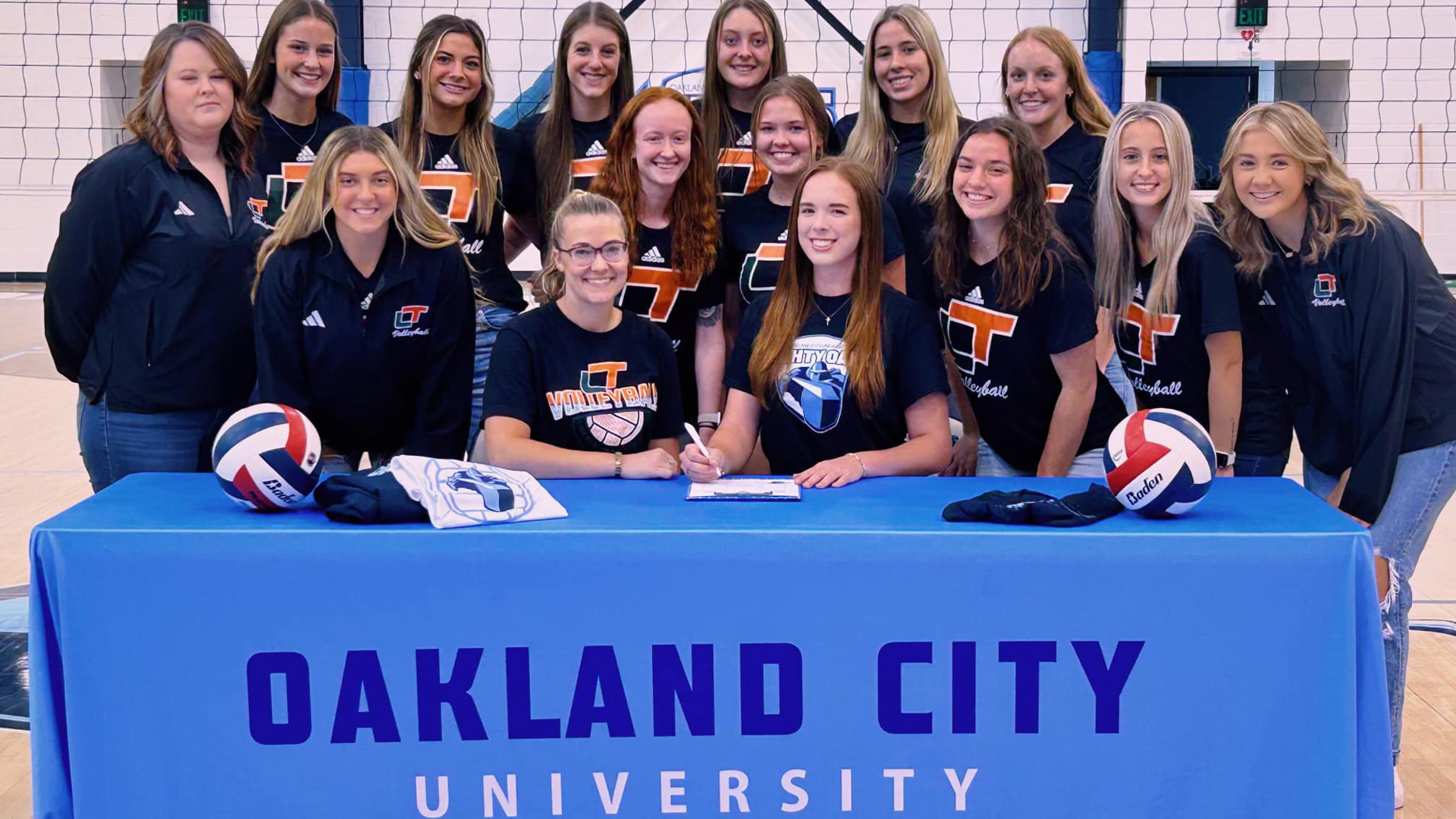 Abigail Vaughn, surrounded by the Lincoln Trail College volleyball team, signs with Oakland City University to continue her collegiate volleyball career.